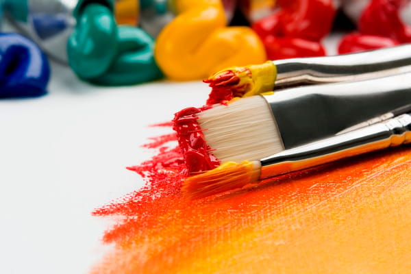 Group art workshop with paints and easels at Dr. Lemco's Creative Club