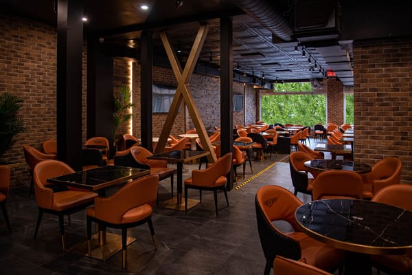 Arabica Lounge seating and mood lighting on Rue Mackay